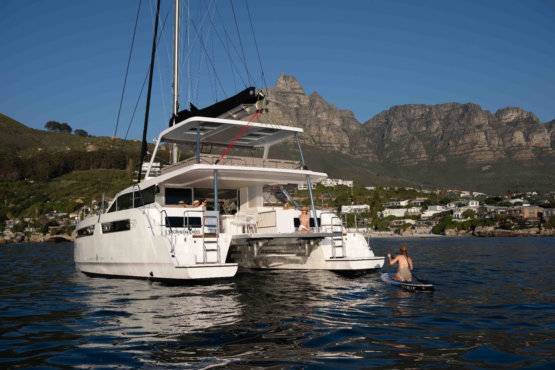 Voyage 510 stern view at anchor beneath the Cape Town mountains