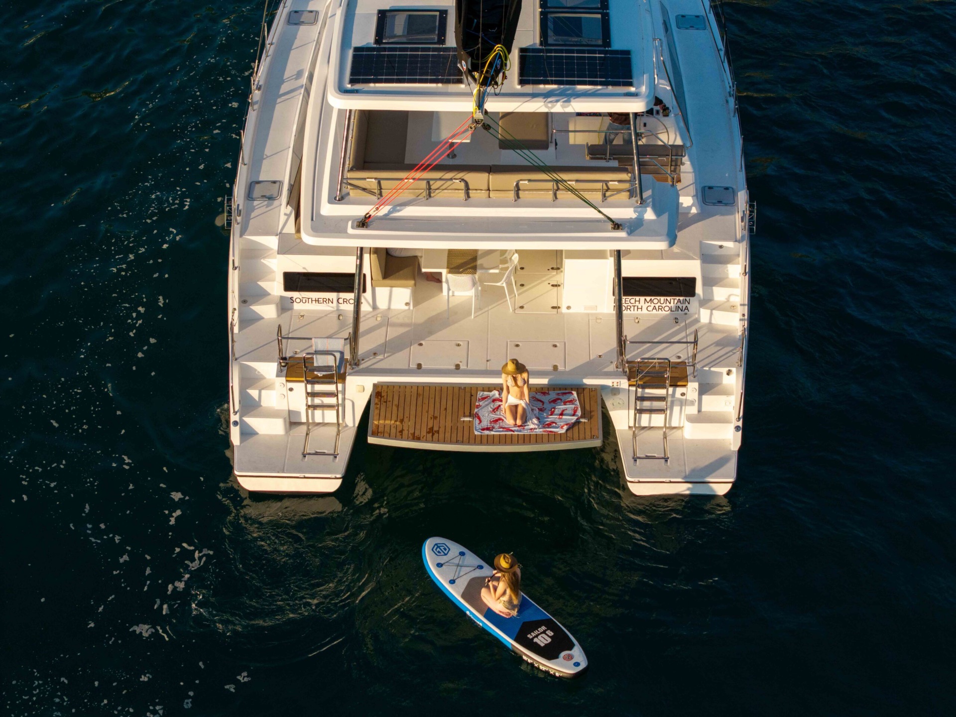 Voyage 510 aft platform with paddleboard viewed from above