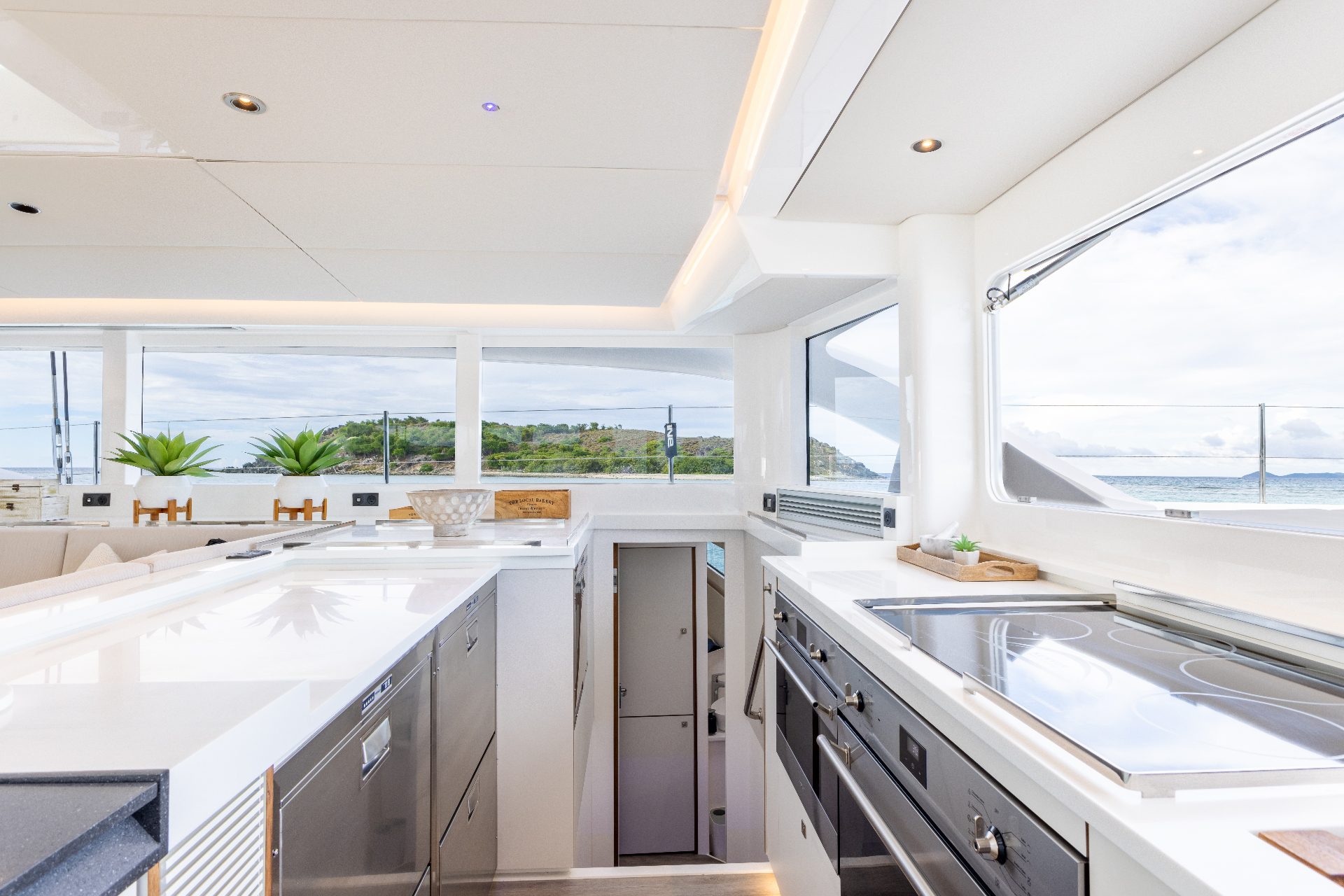Voyage 590 galley with panoramic saloon views