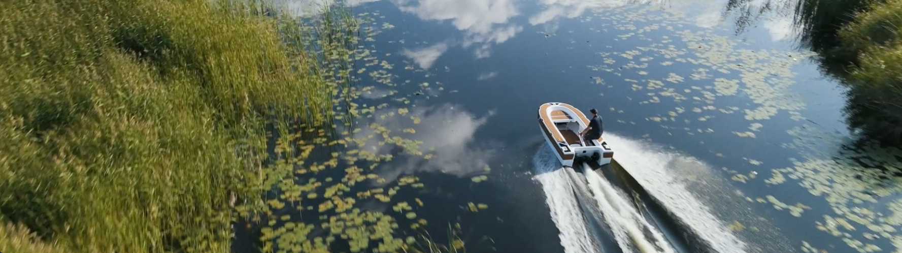 Spark electric tender cruising on water