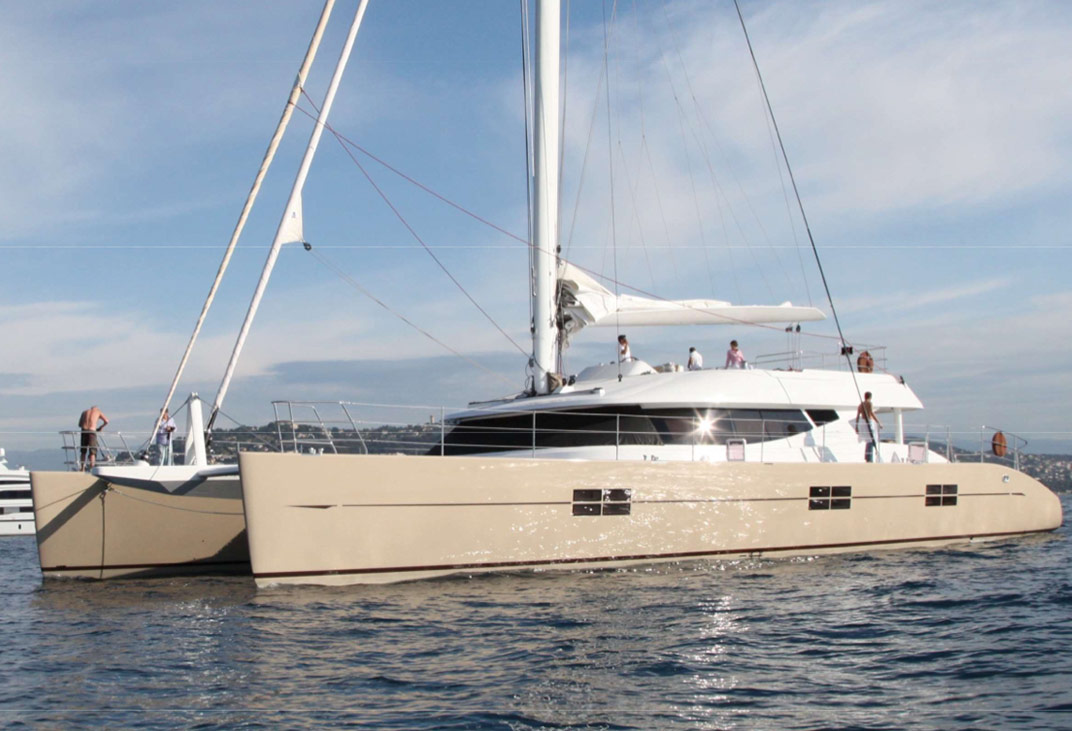 Blue Coast 92 side view at anchor